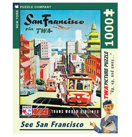 The front of the puzzle box is shown with the image of a tour guide gesturing to a busy street in San Francisco with an airplane flying over. At the top of the image are the words, "San Francisco via TWA" in black and green lettering.