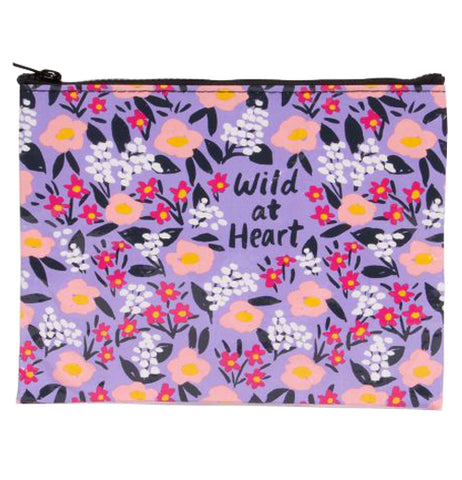 This zipper pouch has a floral pattern with red and white flowers and black text in the center that reads "Wild at Heart"