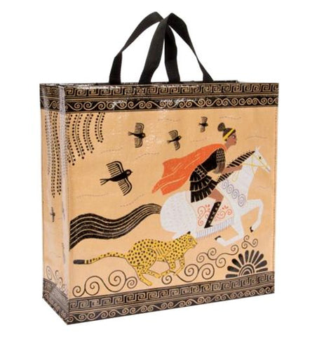 The "Hero" Shopper Tote Bag features a person riding on a white horse wearing an orange cape with a leopard running along side. 
