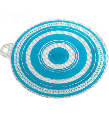 A white and blue jar opener is textured and shaped like a circle, with a hole that sticks out for hanging.