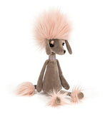 Front view of swellegant "Penelope Poodle" faces right its mocha body has a bright pink mane, boot cuffs, tail end and eye lashes over its black eyes. It wears a shiny pink collar over its neck.