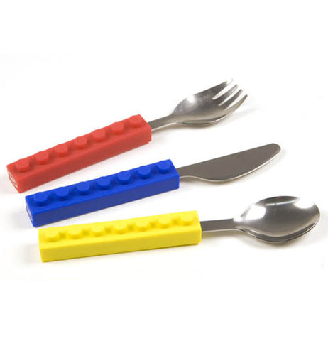 Set of utensils with lego handles, there's a blue knife, red fork and yellow spoon