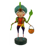 Kid dressed as a snake charmer. He is wearing a blue turbin and has a cobra wrapped around his neck. He is also carrying a pumpkin basket.