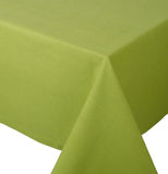 The Rectangle "Spectrum" Tablecloth is cactus green-colored and folded at the end of the table. 