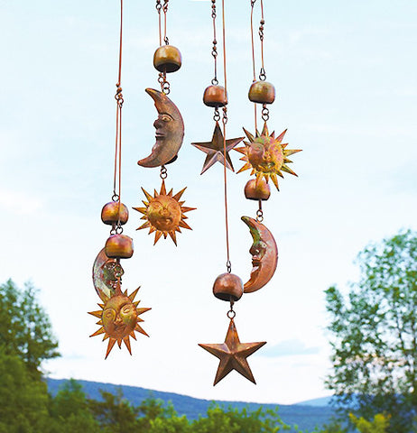 Sun, moon & stars connected to a mobile hanging outside.