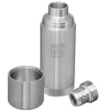 A steel water bottle. The lid is taken apart and is sitting to the left and right.