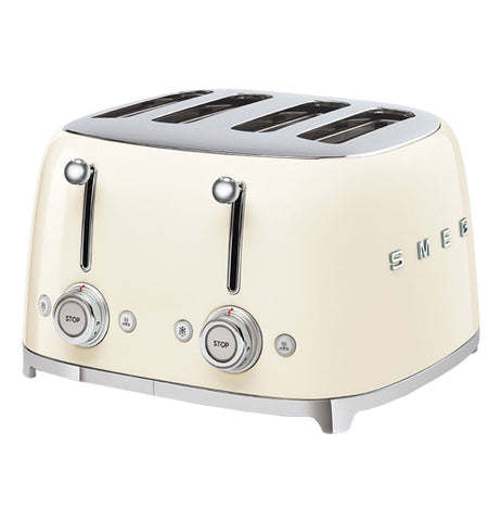 a cream colored toaster with 4 slots on top, on the right side of the word SMEG. the front has 2 sets of sliders and below them are two sets of buttons, one has a snowflake, the other a heat symbol, between each set is a knob that controls the cooking.