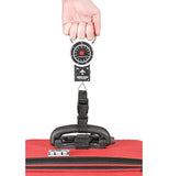 Travel luggage scale being used to weigh out the luggage before a flight.