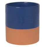 Navy blue glazed and brownish-red terracotta kitchen utensil crock.