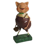 A "Three Little Pigs" figurine holding a basket wearing brown overalls, a yellow shirt with a green bow tie standing on a green pedestal over a white background. 