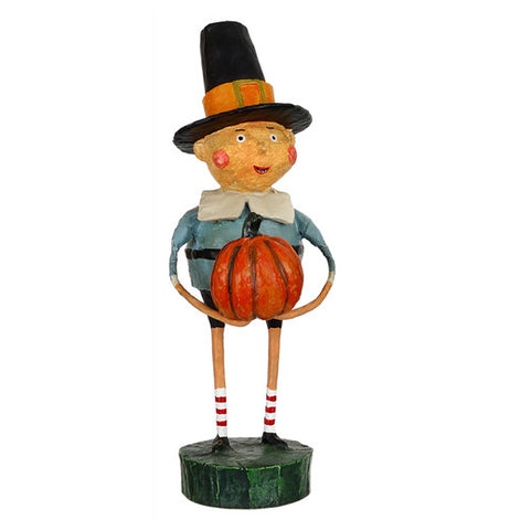 This figurine is named Tom, and wears blue pilgrim clothing with a black top hat. He also carries an orange pumpkin.