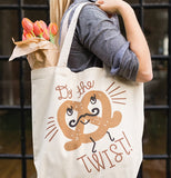 The lady carrying the "Do the Twist" Tote Bag after shopping. 