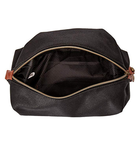 The Waxed Canvas "Charcoal' Wash Bag is seen open from above.