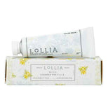 Hand creme, "Wish" Shea Butter, is in a white container with yellow and blue flowers and package matches.