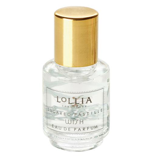 Perfume is in a clear bottle with a gold top.