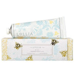 Hand creme, "Wish" Shea Butter, is in a white container with yellow and blue flowers and package matches.
