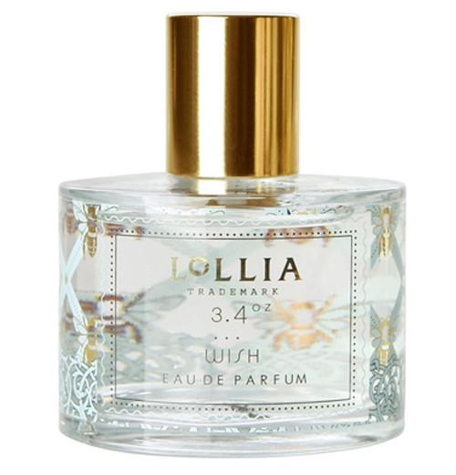 Perfume is in a clear bottle with a gold top.