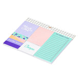 The collection of different colored notepads is shown from a different angle.
