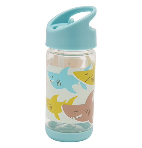 A mostly transparent water bottle has a pastel blue top and bottom. In the middle, there is a design of pastel blue, yellow, and red sharks. The front of the bottle is angled to the left. The spout is down.