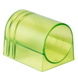 This green circular transparent tool has a flat bottom to rest on the cutting board and two holes at one end to fit a knife blade through.