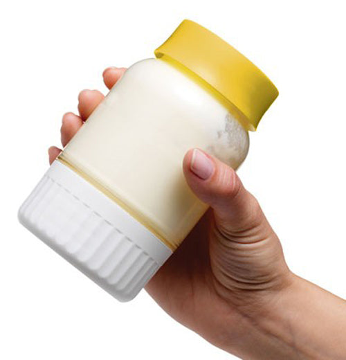 Shaking up the cream to make butter in the butter maker.