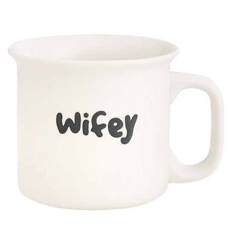 The Engraved "Wifey" Mug features black text that reads "Wifey" on white background. 