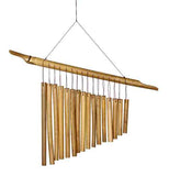 A softwood wind chime is hung by a wire frame. It has 16 chimes sorted from largest to smallest. A wooden bar helps to hang them.