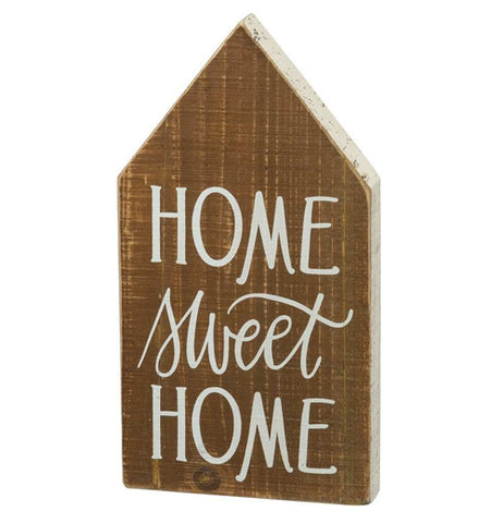The Chunky Sitter is a house shaped brown wooden sign that features text that reads, "Home Sweet Home" in white words. 