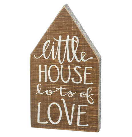 The "Little House" Chunky Sitter is house shaped brown wooden sign that reads, "Little House Lots of Love" in white words. 