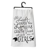 Dish towel with black text on it.