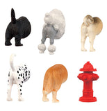 Five dog butt and one fire hydrant magnets in two rows.