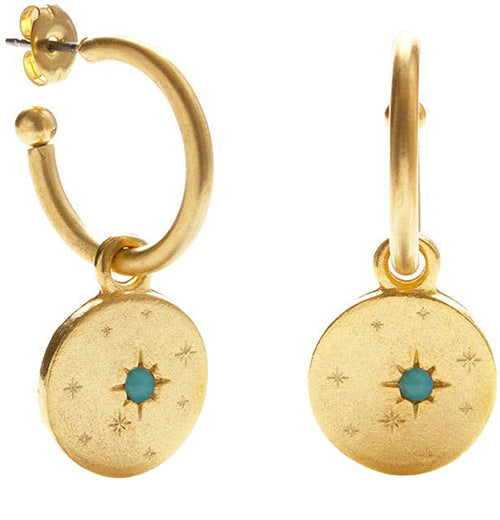 Two brass hoop earrings with a turquoise stone inset in the middle and a star design.