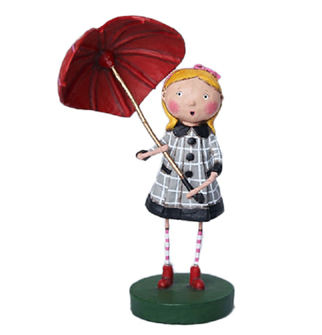 A resin figurine of a blonde girl. She holds a red heart shaped umbrella, and wears a plaid black, gray, and white rain jacket, pink and white striped socks, and red boots. Her hair is pulled back with a pink ribbon. She stands on a green base.