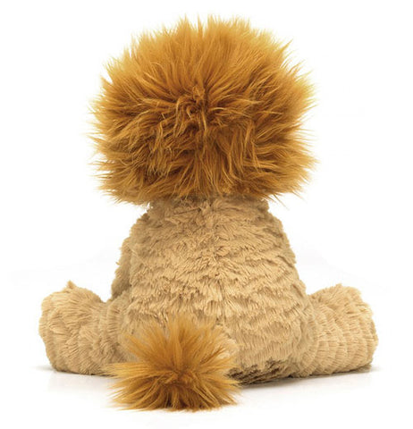 View of the back of medium Fuddlewuddle lion with amber colored mane and tail tip.
