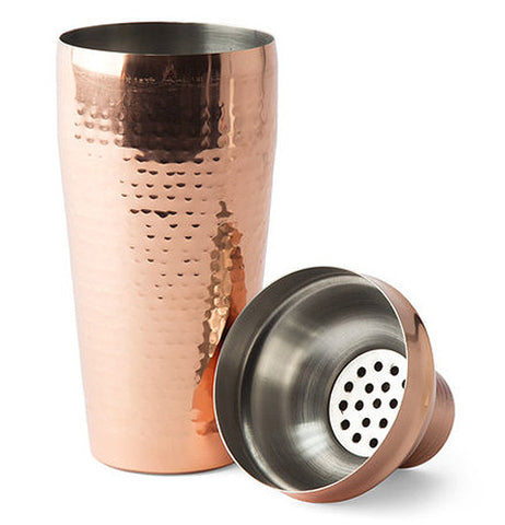 The "Hammered Copper" cocktail shaker is shown with its measuring cap taken off.