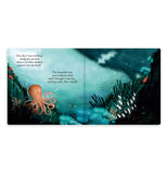 Two pages of the book are open showing the octopus on the left page. The right of the book is shown in darker shadows, and the text on the left page explains how the water seems to start going dark.