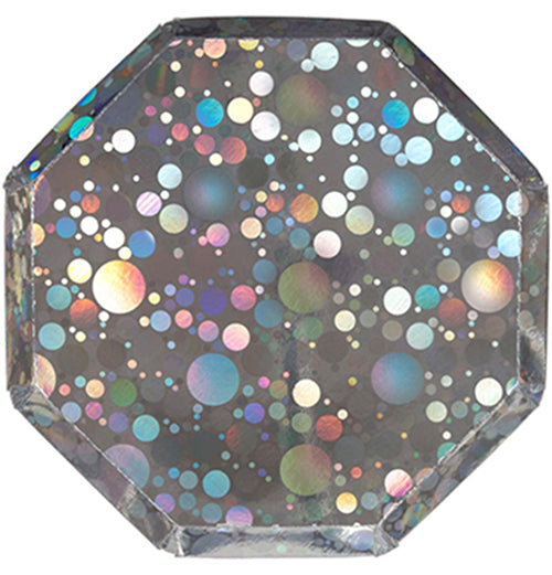 A gray octagonal plate with holographic foil, multi-colored circles all throughout it.