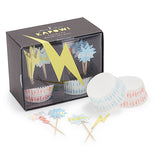 This image shows the "Super Hero" Cupcake Kit with its two sets of cupcake wrappers one with red lightning bolts and other with blue lightning bolts, along with 24 cupcake toppers in 4 styles of yellow lightning bolts, blue BOOM action balloons, blue BAM action balloons and red ZAP action balloons. 