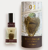 This perfume has a birds nest with an egg falling in the nest alongside its box that shows the same picture and says TOKYOMILK