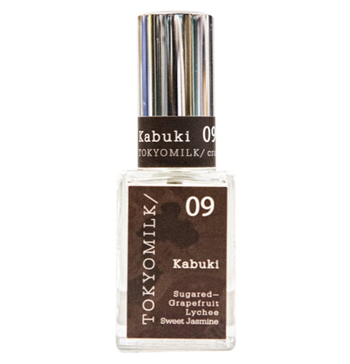 Kabuki perfume bottle with square base the contains the text that describes the scent of the perfume and chrome lid that contains the words "Kabuki" and Tokyo Milk
