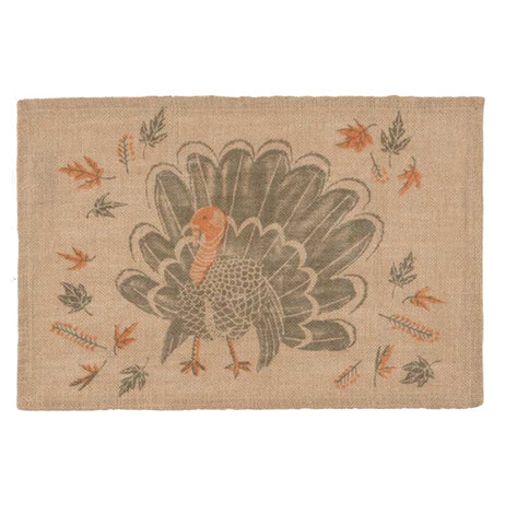 A brown placemat with a big turkey on it with different leaves.