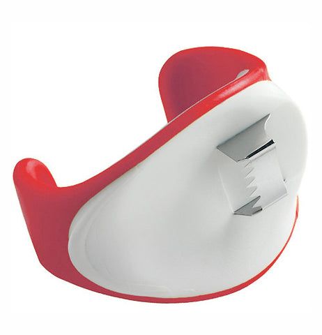 Contouring shaped blade to cut corn that is colored red and white.