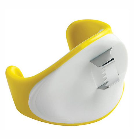 Contouring shaped blade to cut corn that is colored yellow and white.