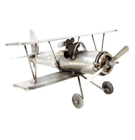This handcrafted metal biplane sculpture has a dog as its pilot.