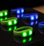 Two sets of blue and green glowing rings are shown.