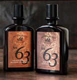 The Men's Hair & Body Wash "No. 63" is shown sitting to the left of a bottle of Body Lotion "No. 63".