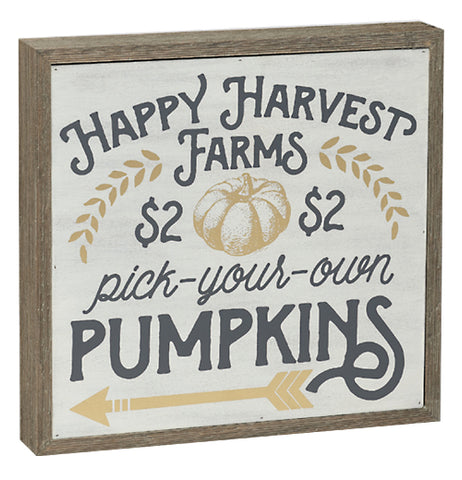 a square box sign that has "Happy Harvest Farms", Pick-Your-Own" and "Pumpkins" in different font styles with pictures of leaves, a pumpkin, and an arrow on it.