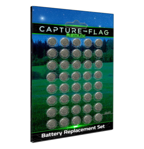 This is a set of 40 small disc-shaped batteries. In their packaging is a cardboard piece with a picture of a field at night. The words at the top of the packaging say, "Capture the Flag" in white lettering.