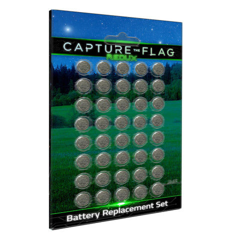 This is a set of 40 small disc-shaped batteries. In their packaging is a cardboard piece with a picture of a field at night. The words at the top of the packaging say, "Capture the Flag" in white lettering.