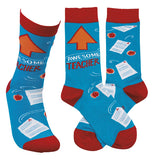 These are blue socks with red heels, toes, and tops. They have orange arrows pointing up with the words, "Awesome Teacher" in red and white lettering with images of apples and graded papers on them over a white background.